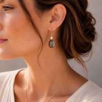 Boucles d'oreilles en nacre noire ovale BONACF0020G