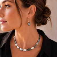 Boucles d'oreilles en nacre noire ovale BONACF0020G